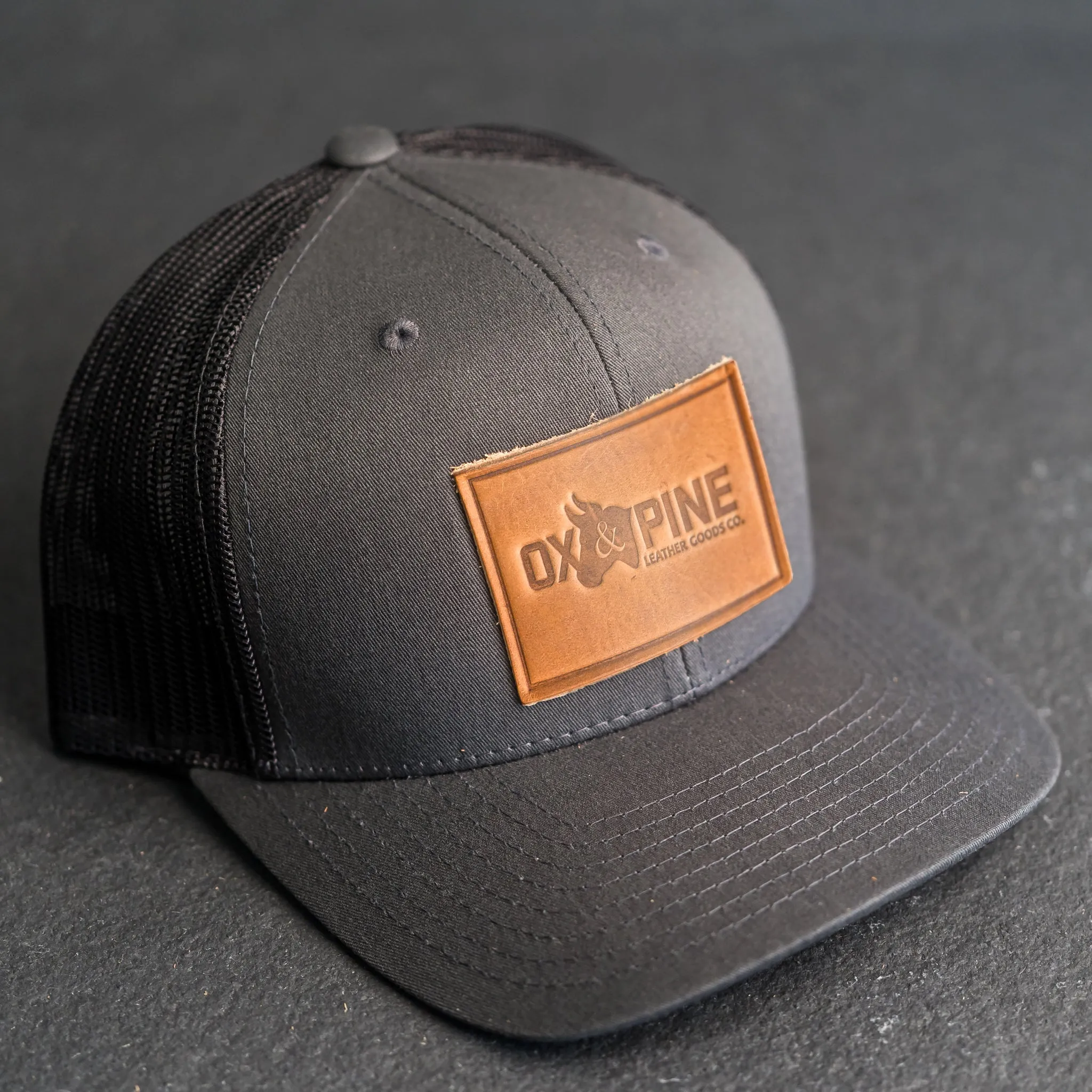 Leather Patch Trucker Style Hat - Ox & Pine Logo